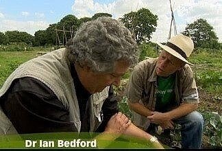 Ian Bedford speaking to a grower