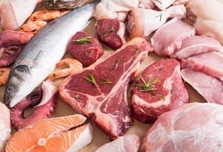 Meat based food items laid out on a table